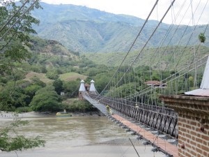 Suspension bridge across the Cauca River, near Santa Fe, Colombia.