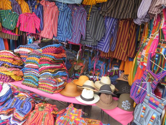 Lots of amazing color at the  Otavalo market. I was taking photos as discreetly as possible, as I wasn't interested in buying anything - just people-watching - so I didn't want to get any hopes up among the vendors.